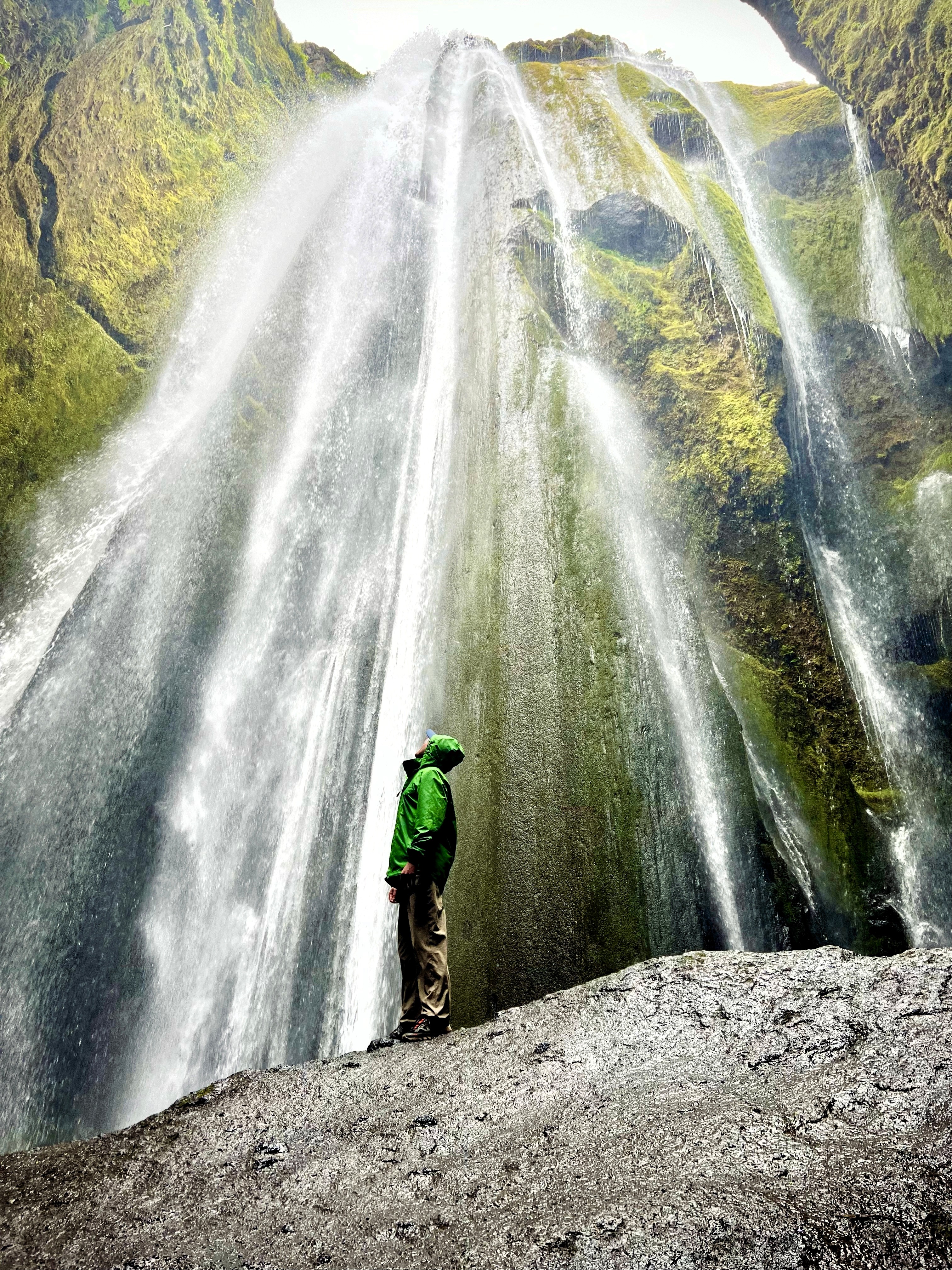 Diptyajit Das hiking near a waterfall